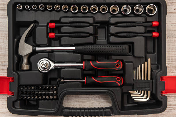 istock new set of wrenches and bits in tool box on wooden desk 1312430444