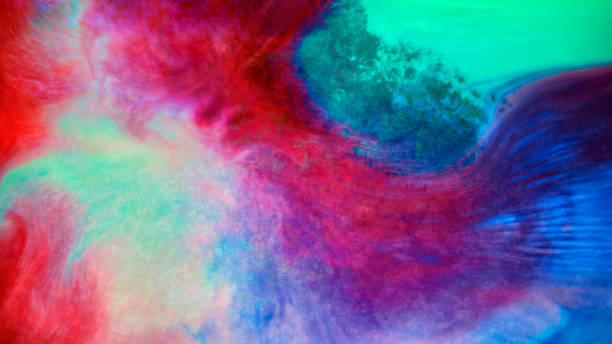 istock Watercolours mixing with water 1312431494