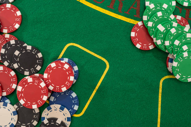 istock Stack of poker chips on a casino table 1312431712