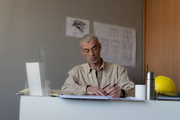 istock The engineer works in his office, trying to find a solution for future jobs. 1312432087