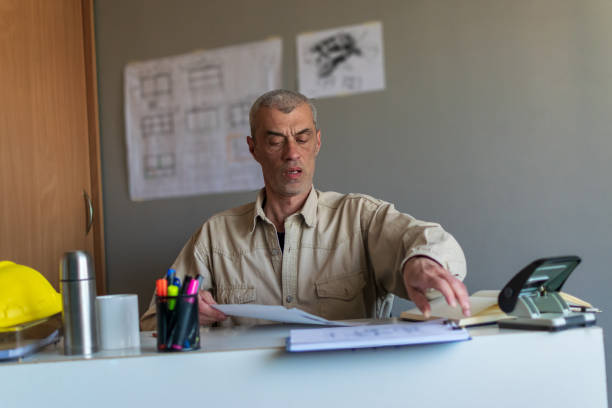 istock The engineer works in his office, trying to find a solution for future jobs. 1312432091