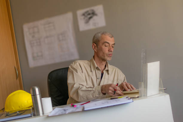 istock The engineer works in his office, trying to find a solution for future jobs. 1312432193