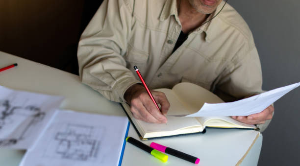 istock The engineer works in his office, trying to find a solution for future jobs. 1312433232