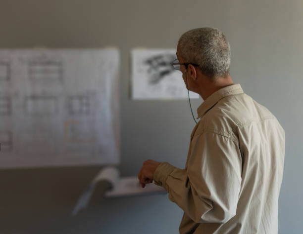 istock The engineer works in his office, trying to find a solution for future jobs. 1312433248