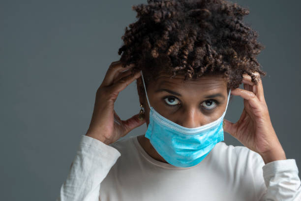 istock Black woman with  a face mask 1312433690