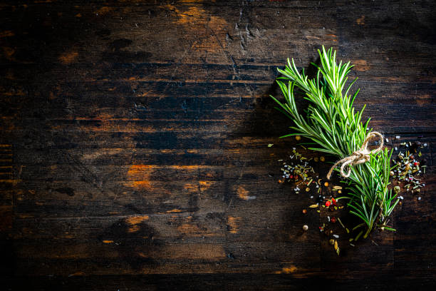 istock Rosemary, salt and pepper top view with copy space 1312438683