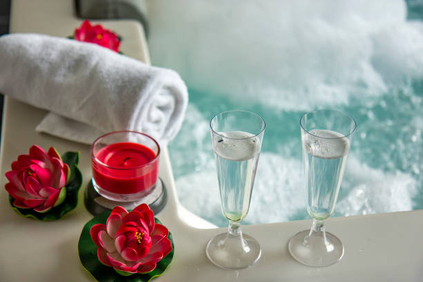istock Champagne glasses on the hot tub 1312439989