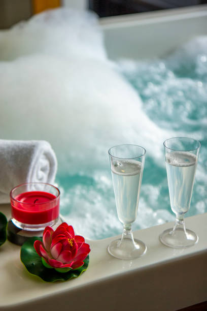 istock Champagne glasses on the hot tub 1312440014
