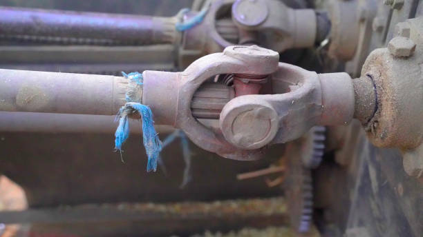 istock Paddy threshing machine cylinder closeup to push up husk. Modern chaff cutter machine closeup. 1312441160