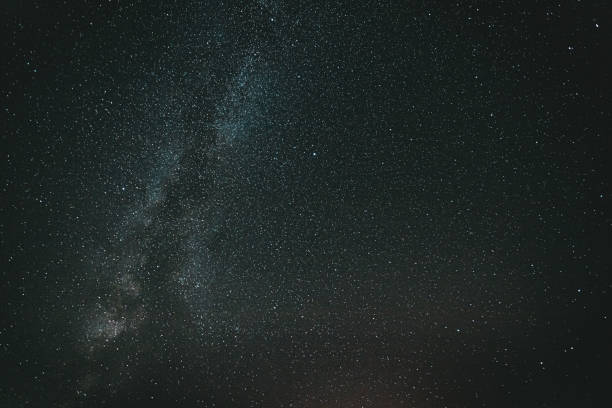 istock Night Sky Stars With Milky Way Galaxy. Dark Starry Sky Background 1312442980