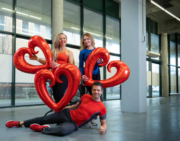 istock personal trainers in gym, valentine theme 1312443043