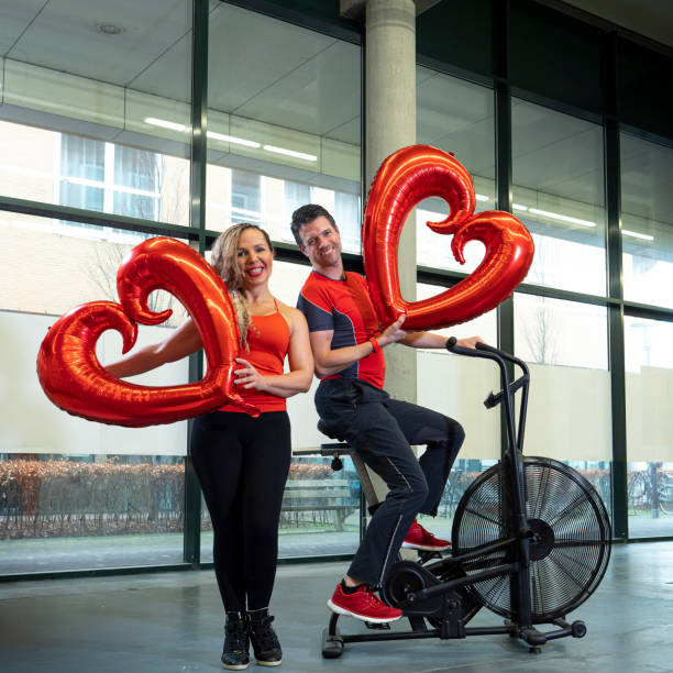 istock personal trainers in gym, valentine theme 1312443063