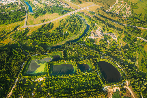 Aerial View Retention Basins, Wet Pond, Wet Detention Basin Or Stormwater Management Pond, Is An Artificial Pond With Vegetation Around The Perimeter, And Includes A Permanent Pool Of Water In Its Design.