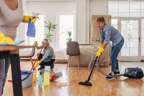 istock Cleaning crew cleaning apartment 1312446860
