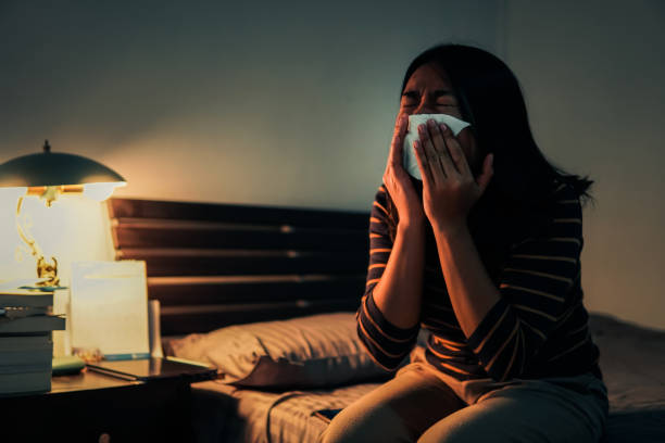 istock Sad Woman Crying While Sitting On Bed At Home 1312446985