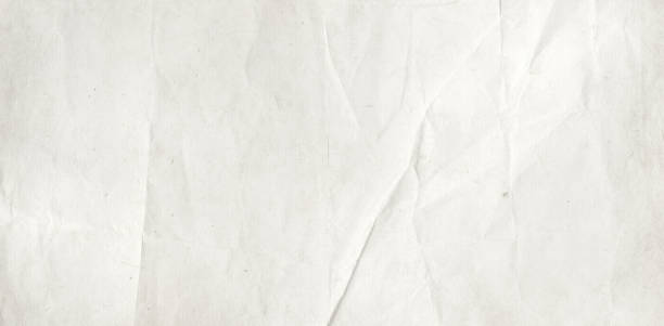 istock Old crumpled paper texture background. Horizontal banner 1312447570