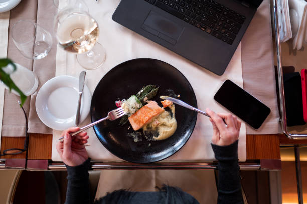 istock Overhead angle on the table in a high end restaurant used as co-working space 1312447691