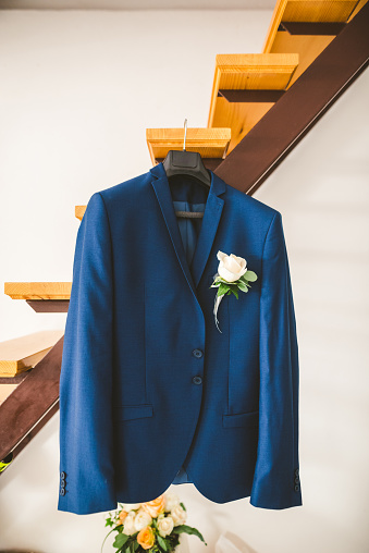 Blue suit hanging ready for the wedding