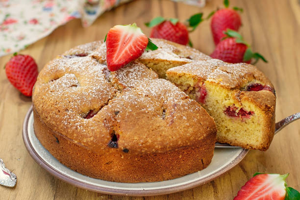 istock Sweet cake with fresh strawberries and powdered sugar 1312454819