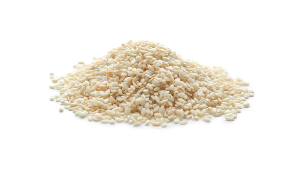 istock Pile of sesame seeds on white background 1312458879