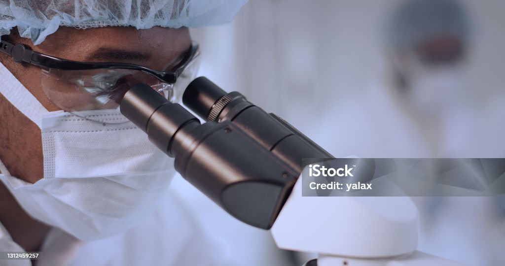 Doctor Using Microscope Imabe African Ethnicity Doctor Using Microscope In Laboratory Team In ...