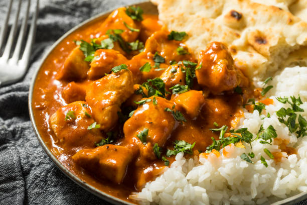 Homemade Indian Butter Chicken with Rice Homemade Indian Butter Chicken with Rice and Naan Bread chicken curry stock pictures, royalty-free photos & images