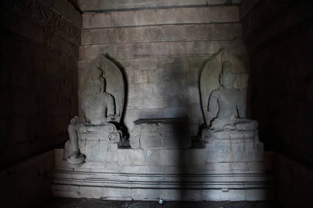 istock Buddha statues at Plaosan Temple, Central Java 9th century Buddhist temple complex in Central Java, Indonesia. 1312461926
