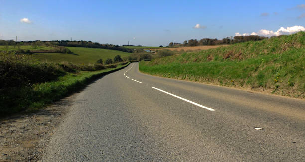istock Open spring farm landscapes with big blue sky plenty of space for text 1312464320