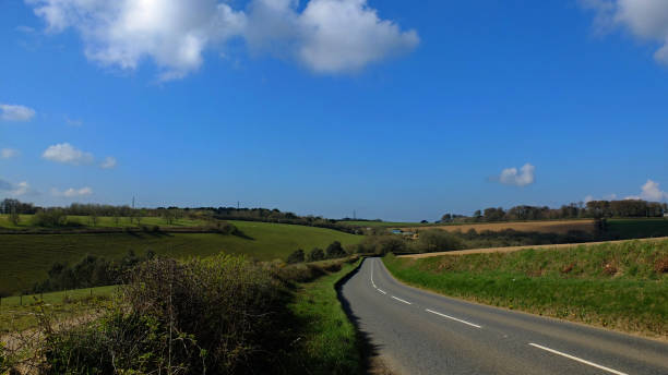 istock Open spring farm landscapes with big blue sky plenty of space for text 1312464327