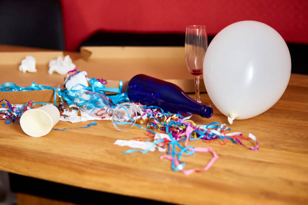 istock Messy wooden table at morning after party. 1312464392