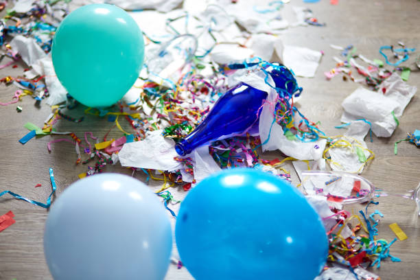 istock Top view of floor with after a party celebration with empty blue bottles 1312464451