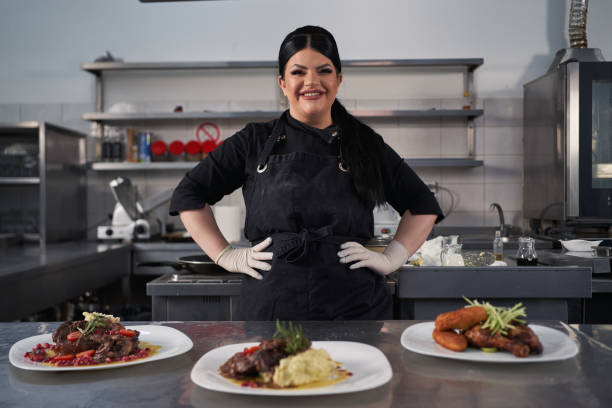 istock Proud and confident female chef with positive emotion 1312465625