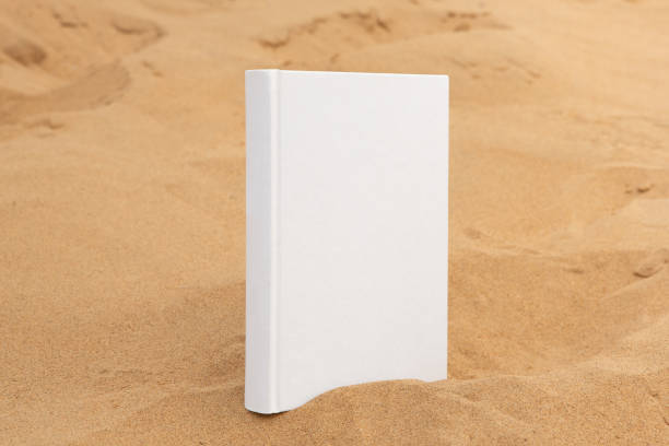istock book with blank cover and empty cover perched on sandstone rock 1312468331