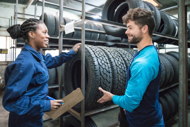 istock Customer choosing car tire in automobile store 1312472635