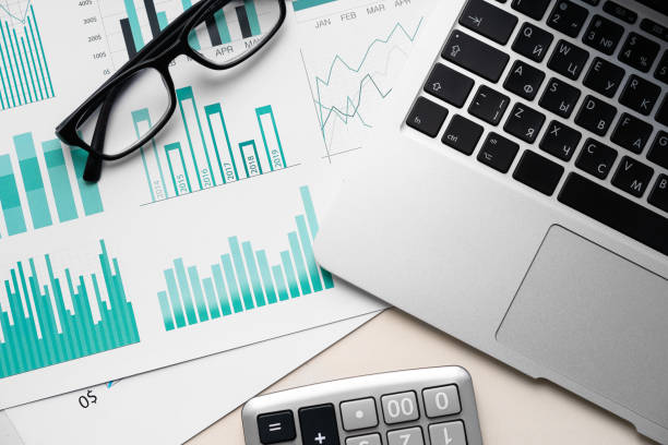 istock Top view of table with financial papers and calculator 1312473853