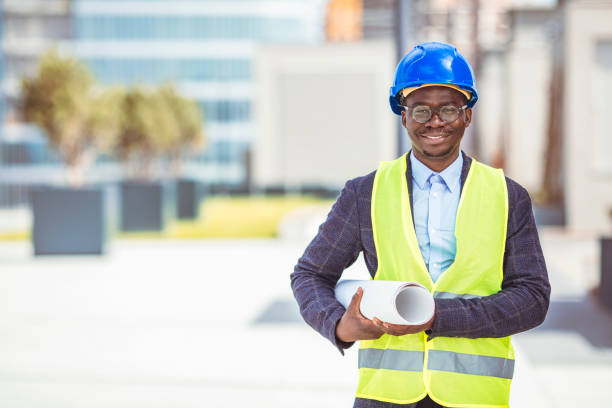 istock Successful male architect at building site looking at camera. 1312474632