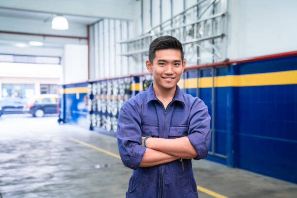 istock Portrait of young auto mechanic at work 1312475229