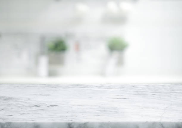 selective focus.marble table top on blur white kitchen room background. - balcão imagens e fotografias de stock