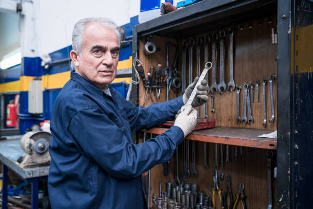 istock Senior car mechanic at work 1312477438