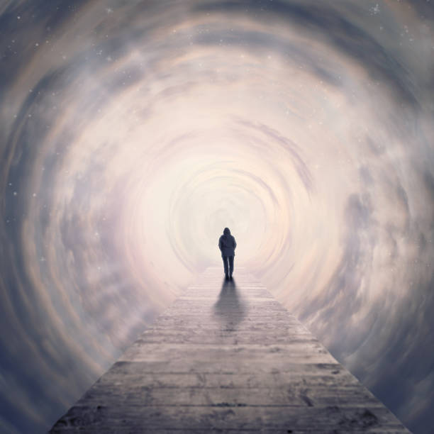 woman walking foreward in tunnel of clouds to the light one woman walking foreward on footbridge in tunnel of clouds into the light allegory painting stock pictures, royalty-free photos & images