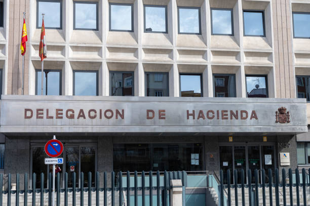 burgos, spain - tax financial figures analyzing banking document imagens e fotografias de stock