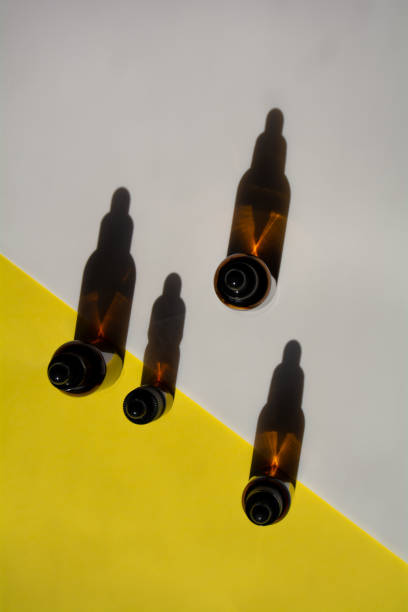 istock Set of bottles for cosmetics on yellow-white background 1312481682