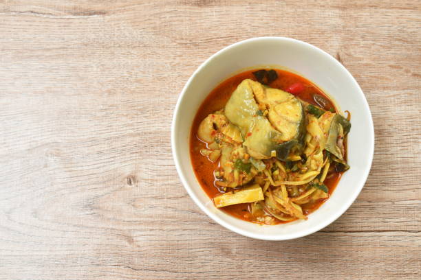 istock spicy boiled bamboo shoot with slice catfish in coconut milk and curry 1312481882