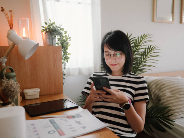 istock Asian female work at home. 1312483636