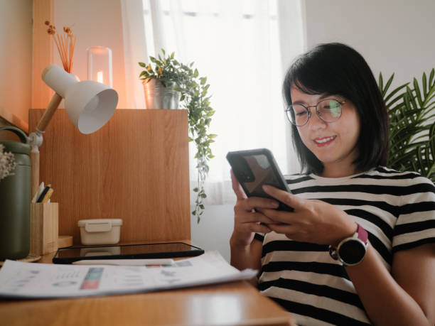 istock Young women finance at home. 1312483715