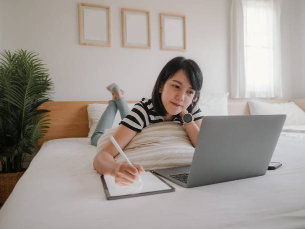 istock Young women finance at home. 1312483823
