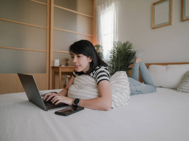 istock Asian female work at home. 1312483870