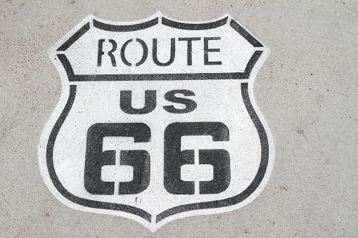 Wall with the name of ROUTE 66. Route 66 (officially US Route 66) is an old American route that linked Chicago (Illinois) to Santa Monica (California), between 1926 and 1985 in the United States.
