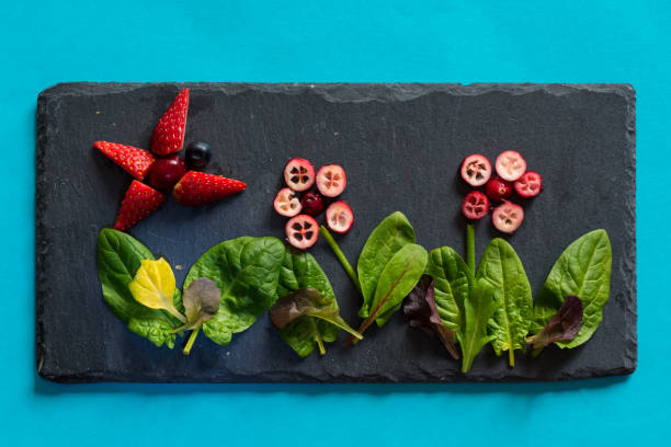 istock creative meal ideas from strawberry for children in black shale background 1312485047