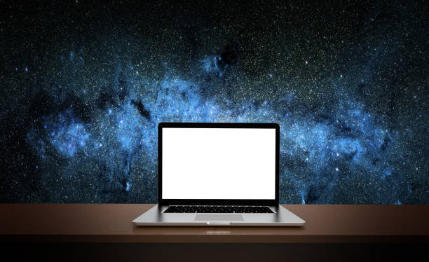 istock Modern laptop  isolated on space background. 3D Illustration. Elements of this image furnished by NASA 1312486314